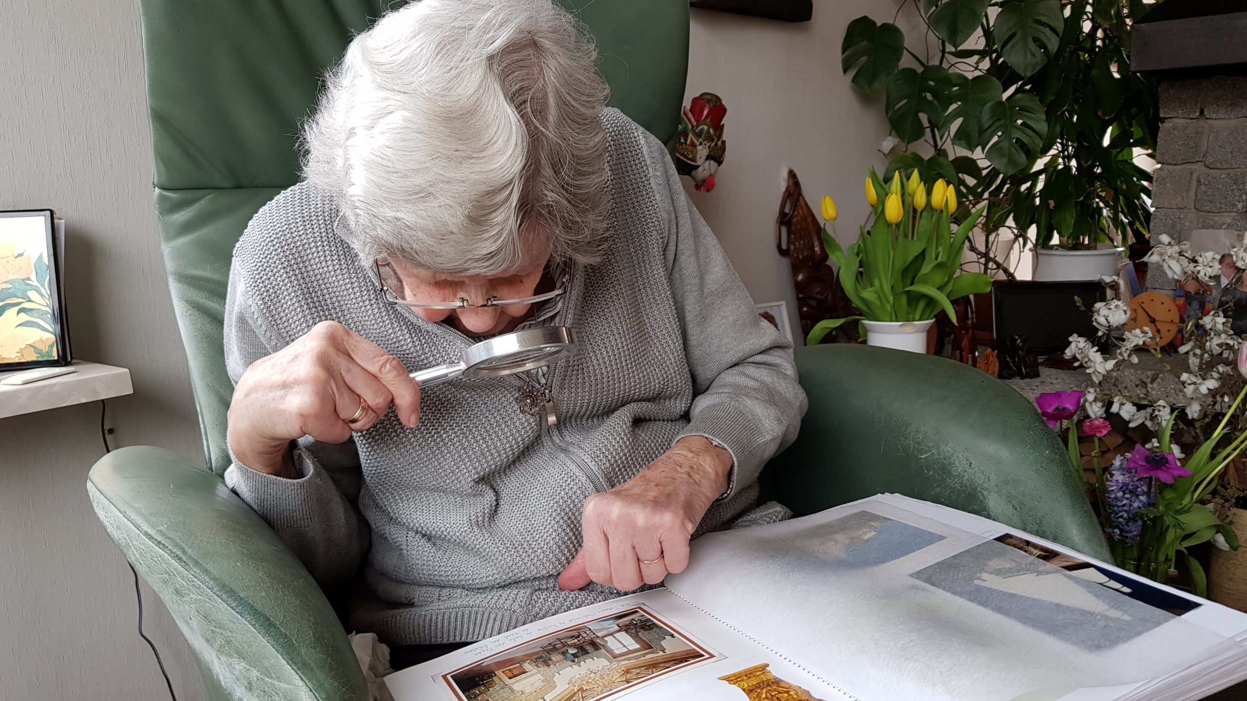pensioner looking at photos